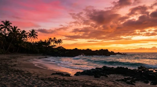 Breathtaking island sunset with vibrant orange and purple sky over tropical coastline