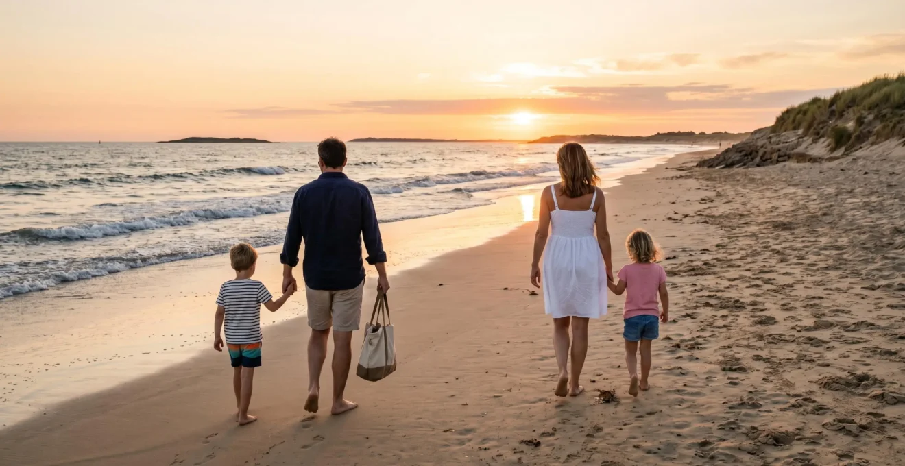 Family walking away from camera on Île de Ré beach during golden hour sunset with Atlantic Ocean visible