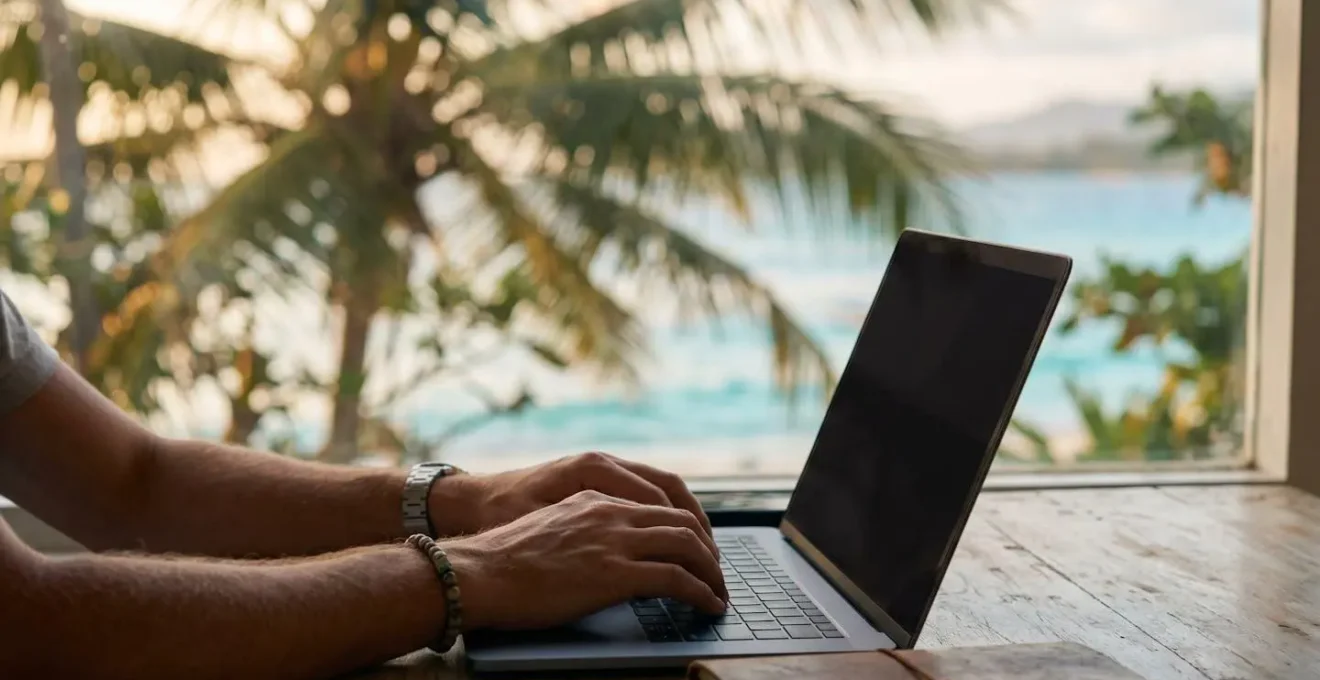 Vigilant traveler researching island vacation rental authenticity on laptop with tropical villa imagery in background