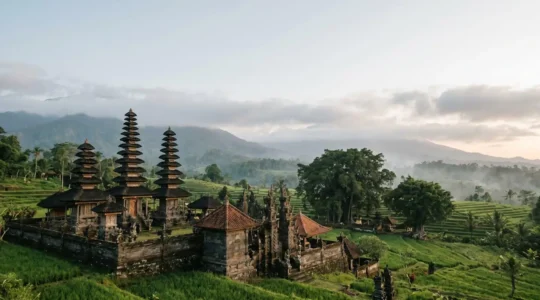 Ancient temple complex on a tropical island with traditional architecture showcasing sacred zones and spiritual elements